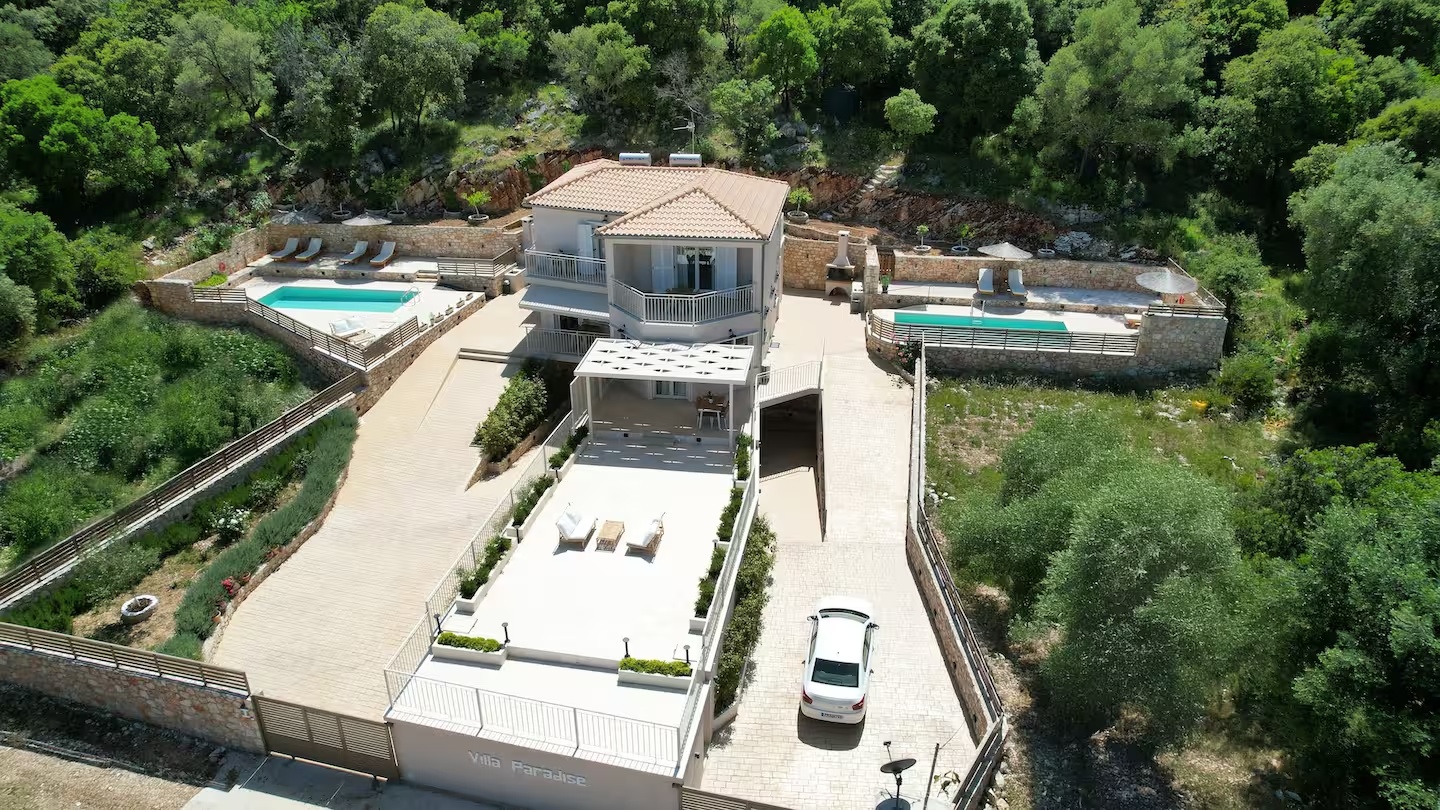 Aerial view of Paradise Villas surrounded by Kefalonian landscape